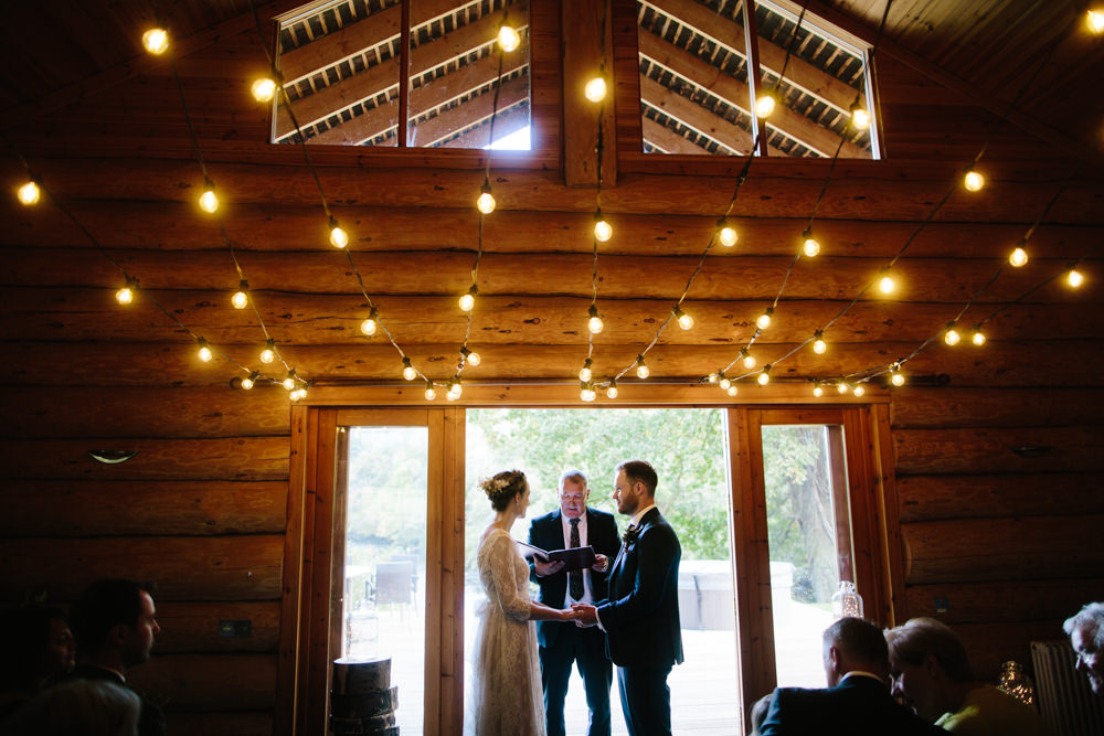 Festoon Lights Ceremony Hidden River Cabins Wedding Dan Hough Photo