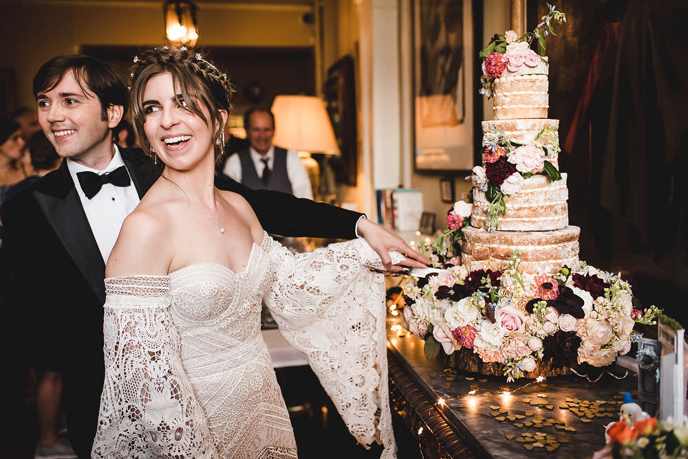 Bride Bridal Rue de Seine Dress Gown 70s Boho Sleeves Headdress Crown Dinner Bow Tie Suit Groom Langar Hall Wedding Robert Leons Photography