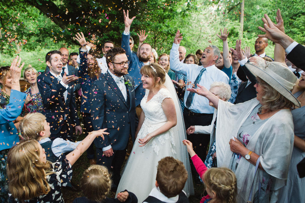 Bride Bridal Ballerina Length Dress Lace Sleeves Navy Suit Bow Tie Groom Veil Confetti Middle Coombe Farm Wedding Emma Stoner Photo