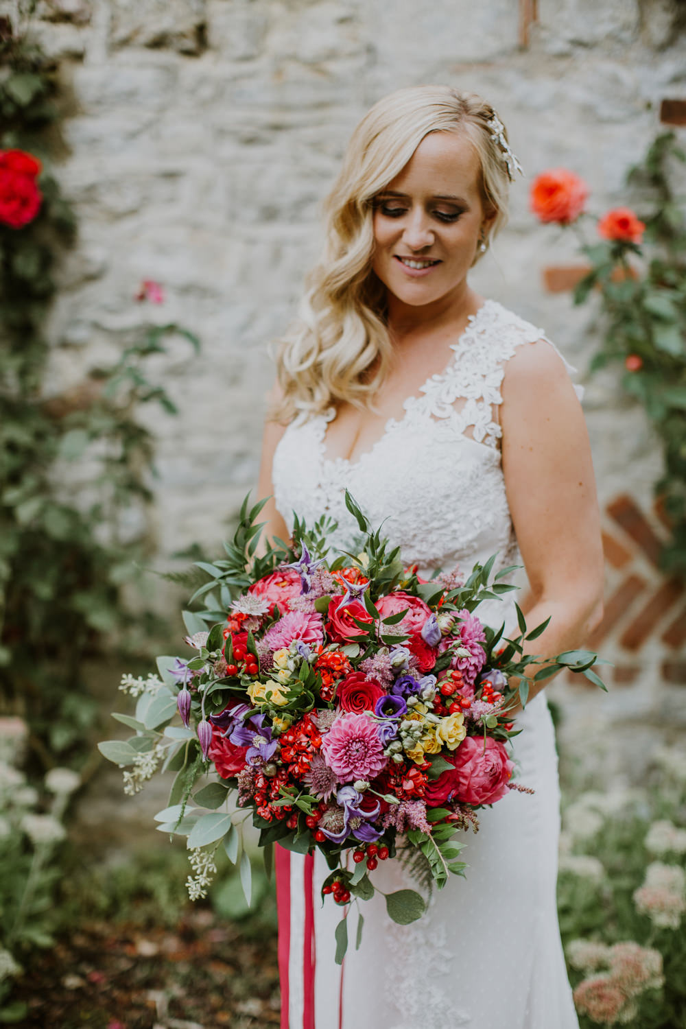 Bouquet Flowers Bride Bridal Pink Red Purple Greenery Foliage Peony Rose Clematis Ribbons Notley Abbey Wedding Alexandra Jane Photography