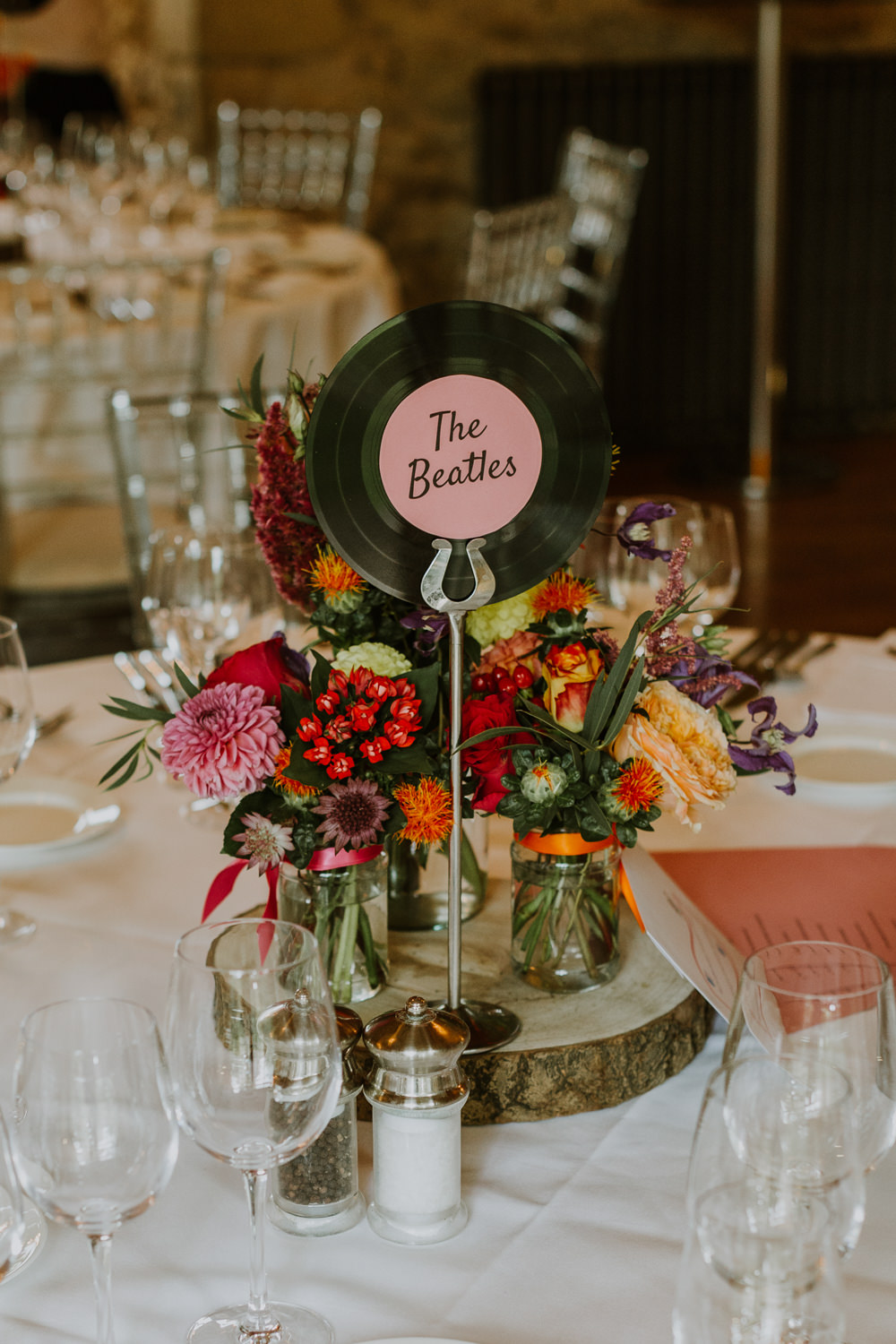 Music Records Vinyl Table Name Centrepiece Log Table Decor Flowers Notley Abbey Wedding Alexandra Jane Photography