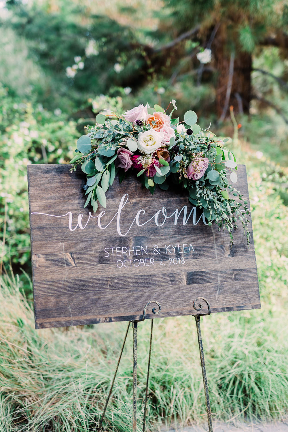 Wooden Welcome Sign Flowers Calligraphy Easel Romantic Soft Elopement Wedding Las Vegas Kristen Joy Photography
