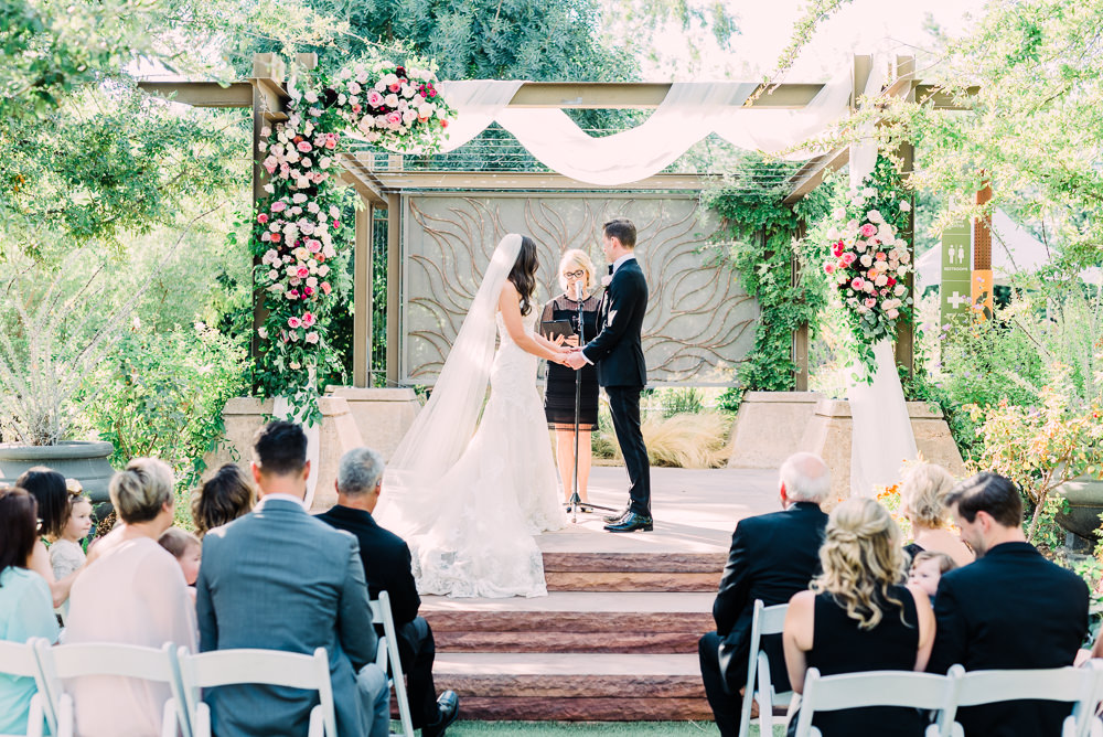 Outdoor Ceremony Wooden Backdrop Arch Drapes Fabric Pink Flowers Romantic Soft Elopement Wedding Las Vegas Kristen Joy Photography