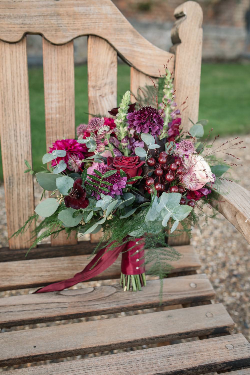 Bouquet Flowers Bride Bridal Red Pink Burgundy Green Greenery Foliage Berry Rose Ribbon Winter Luxe Wedding Ideas Becky Harley Photography