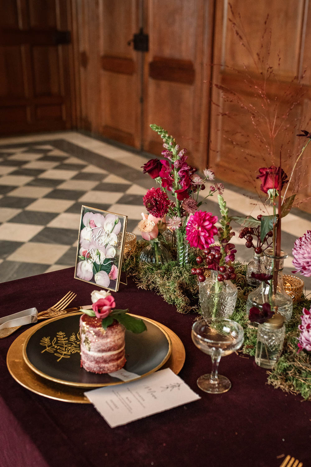 Table Tablescape Decor Red Velvet Cloth Flowers Pink Bottles Moss Gold Candles Plates Winter Luxe Wedding Ideas Becky Harley Photography