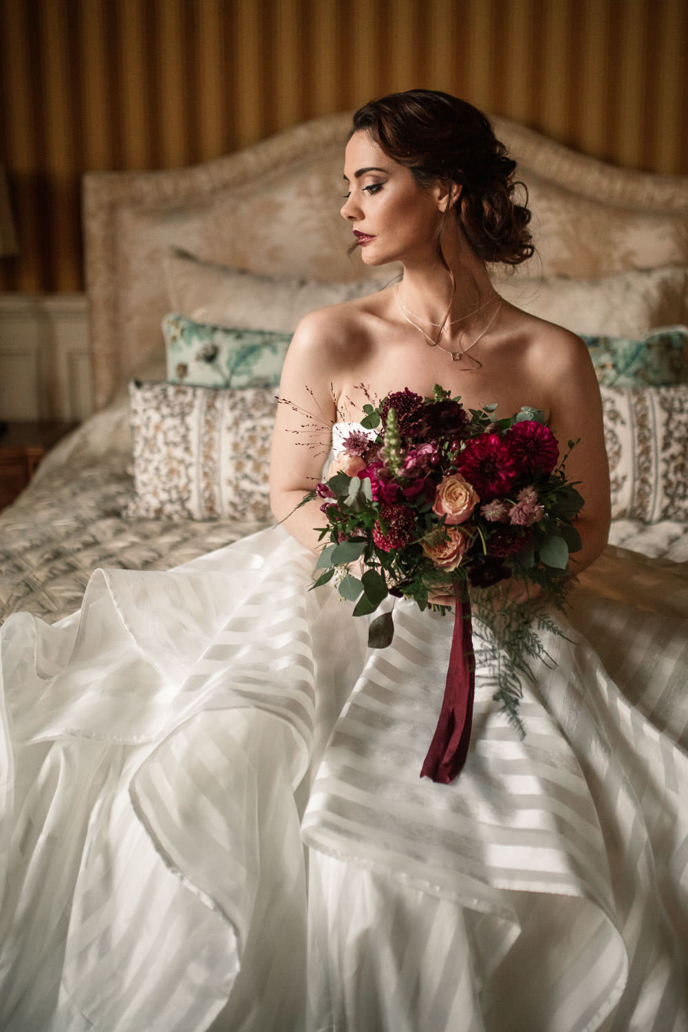 Bouquet Flowers Bride Bridal Red Pink Burgundy Green Greenery Foliage Berry Rose Ribbon Winter Luxe Wedding Ideas Becky Harley Photography