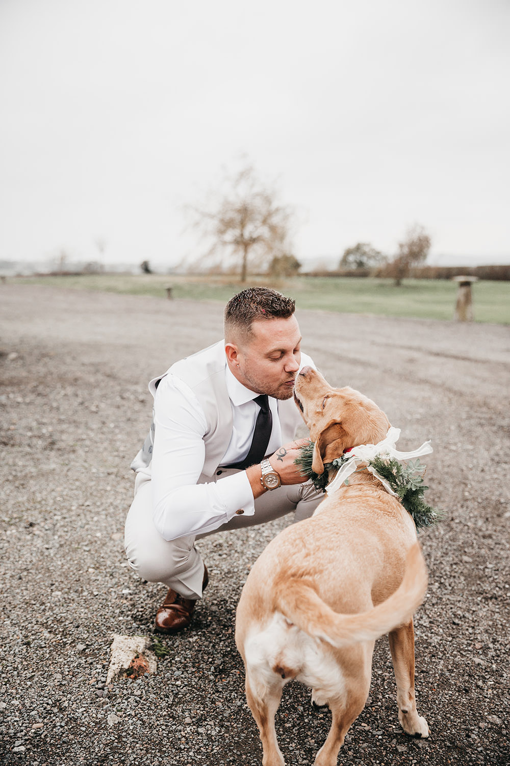 Cream Waistcoat Suit Groom Dog Greenery White Bow Big Barn Wedding Ashley The Vedrines Photography