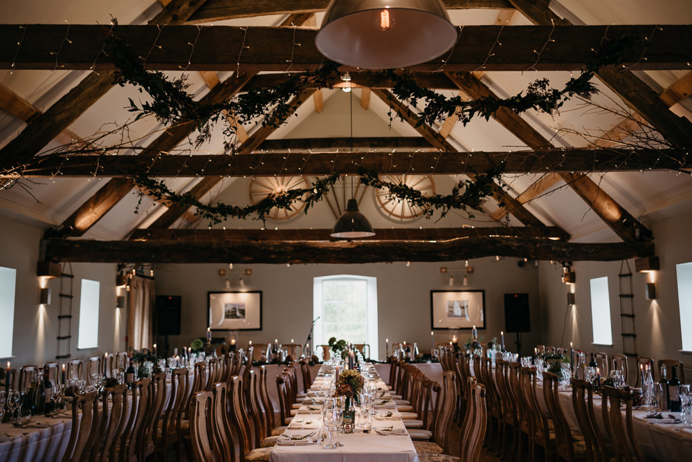 Fairy Lights Barn Greenery Beams Foliage Decor Bodnant Welsh Food Wedding Elaine Williams Photography