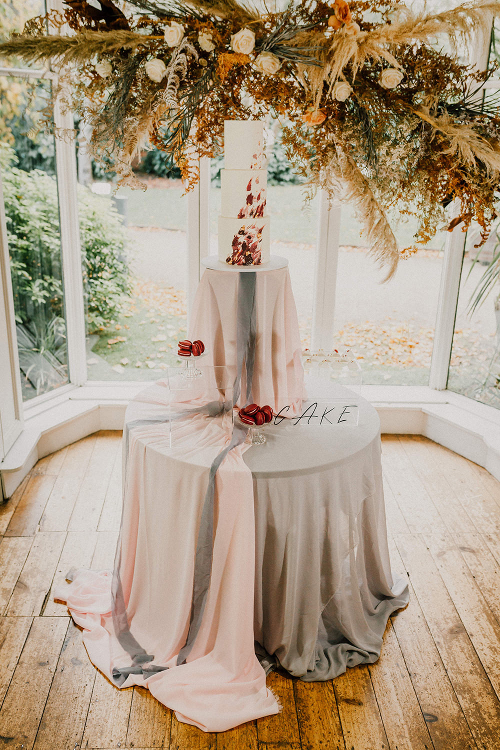 Cake Table Grasses Flowers Backdrop Installation Suspended Pampass Grass Sign Bohemian Music Folk Wedding Ideas Gail Secker Photography