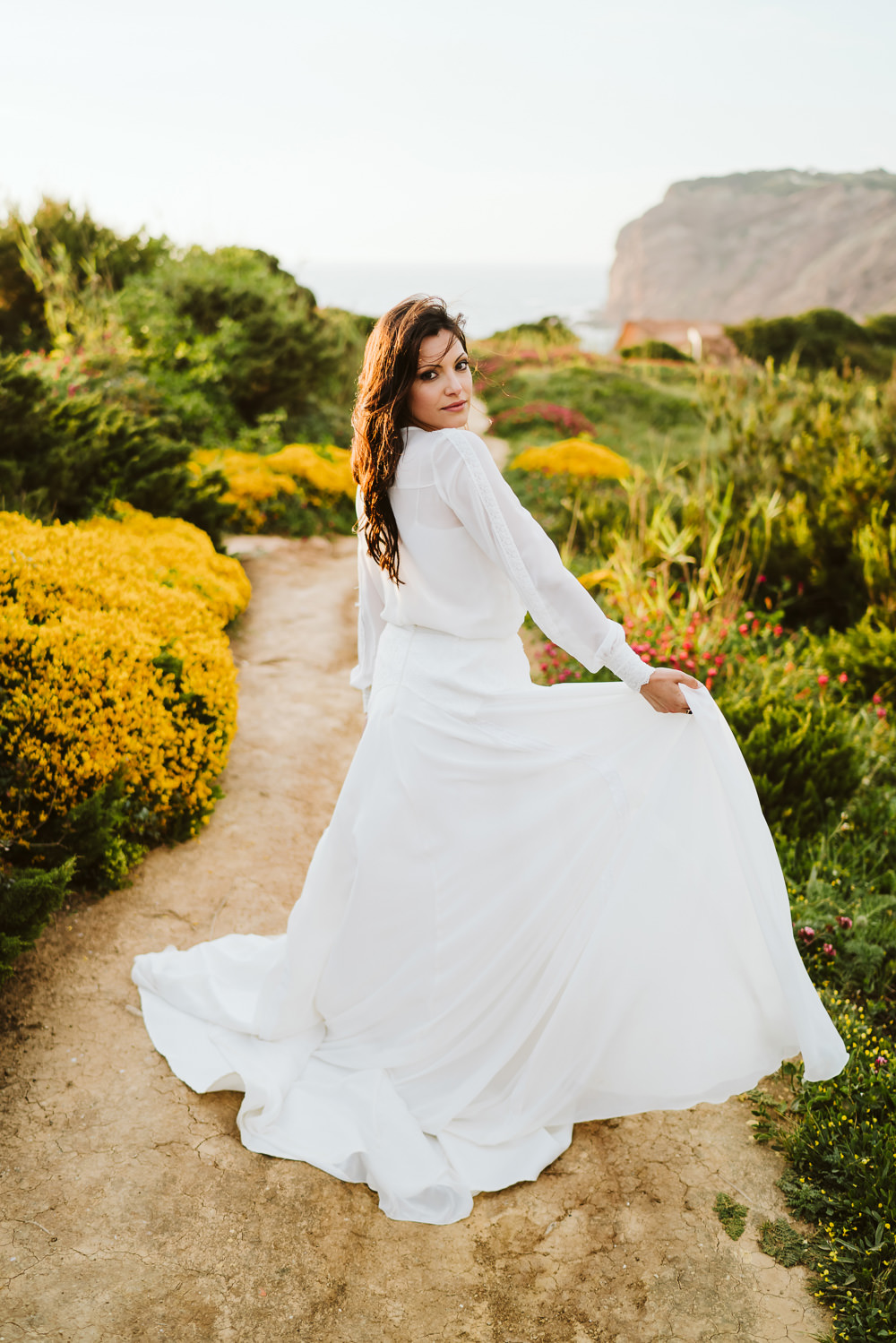 Dress Gown Bride Bridal Buttons Skirt Long Sleeves Clifftop Portugal Wedding Ideas John Barwood Photography