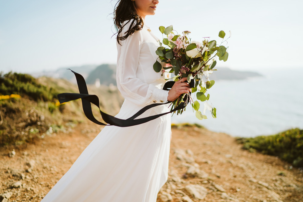 Bouquet Flowers Bride Bridal Black Ribbon Foliage Greenery Rose Berry Clifftop Portugal Wedding Ideas John Barwood Photography