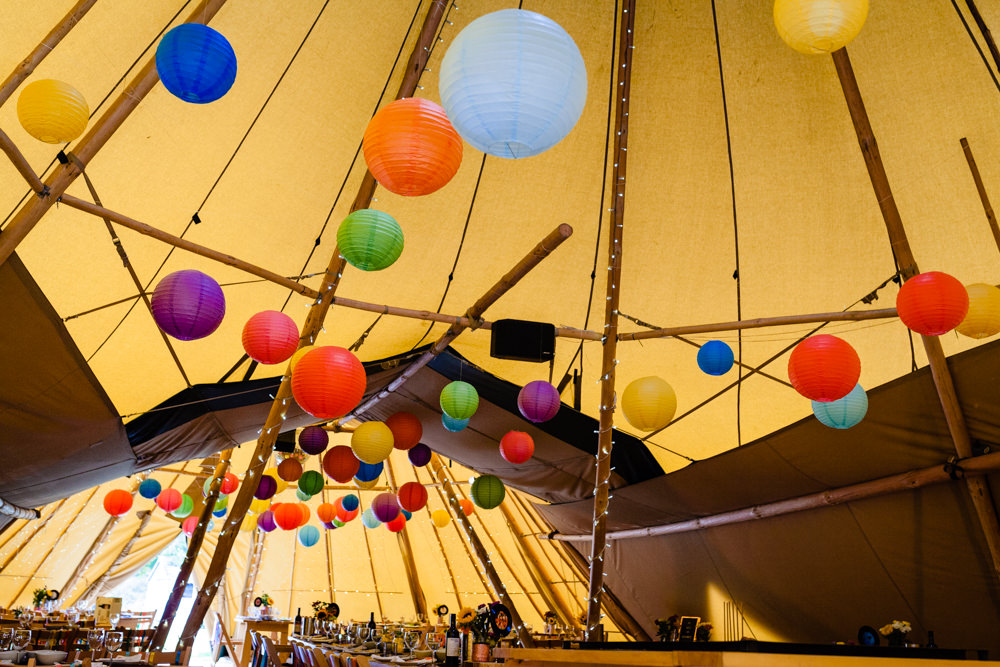 Tipi Lanterns Decor Rustic Tables Rainbow Decor Colourful Festival Party Wedding Emma and Rich Photography