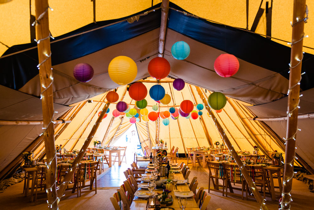 Tipi Lanterns Decor Rustic Tables Rainbow Decor Colourful Festival Party Wedding Emma and Rich Photography