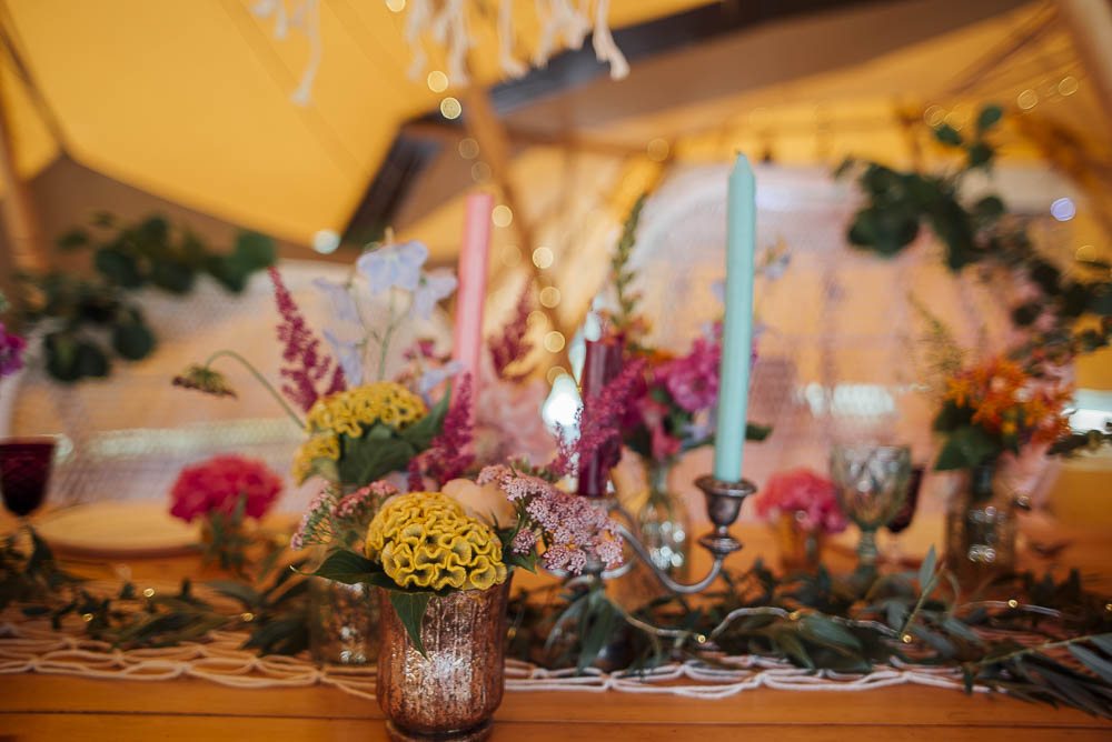 Table Flowers Bottles Decor Centrepiece Wild Meadow Candles Colourful Pretty Floral Tipi Boho Wedding Ideas Purple Pear Tree Photography
