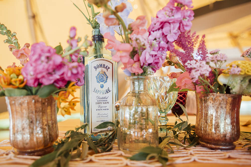 Table Flowers Bottles Decor Centrepiece Wild Meadow Colourful Pretty Floral Tipi Boho Wedding Ideas Purple Pear Tree Photography