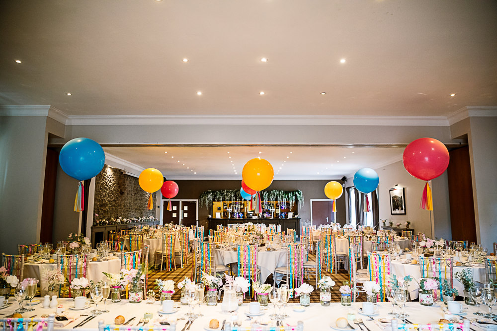Reception Room Decor Giant Balloons Colourful Tassel Ribbons Coniston Hotel Wedding Hayley Baxter Photography
