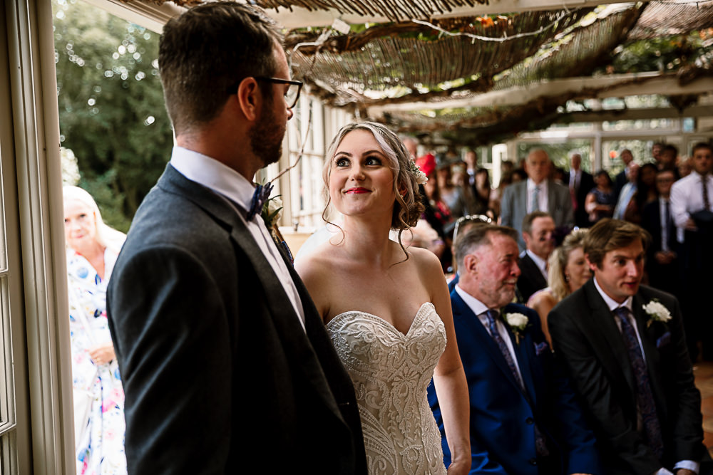 Bride Bridal Dress Gown Sweetheart Neckline Lace Braided Up Do Plait Bow Tie Groom Crab and Lobster Wedding Hayley Baxter Photography