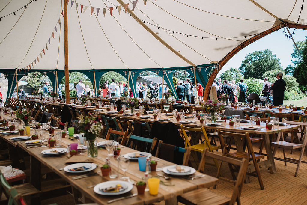 Pole Tent Marquee Rustic Furniture Table Chairs Festoon Lights Bunting Open Sides Eco Friendly Wedding The Stag and the Doe