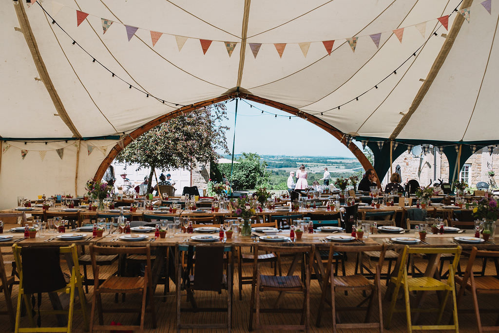Pole Tent Marquee Rustic Furniture Table Chairs Festoon Lights Bunting Open Sides Eco Friendly Wedding The Stag and the Doe