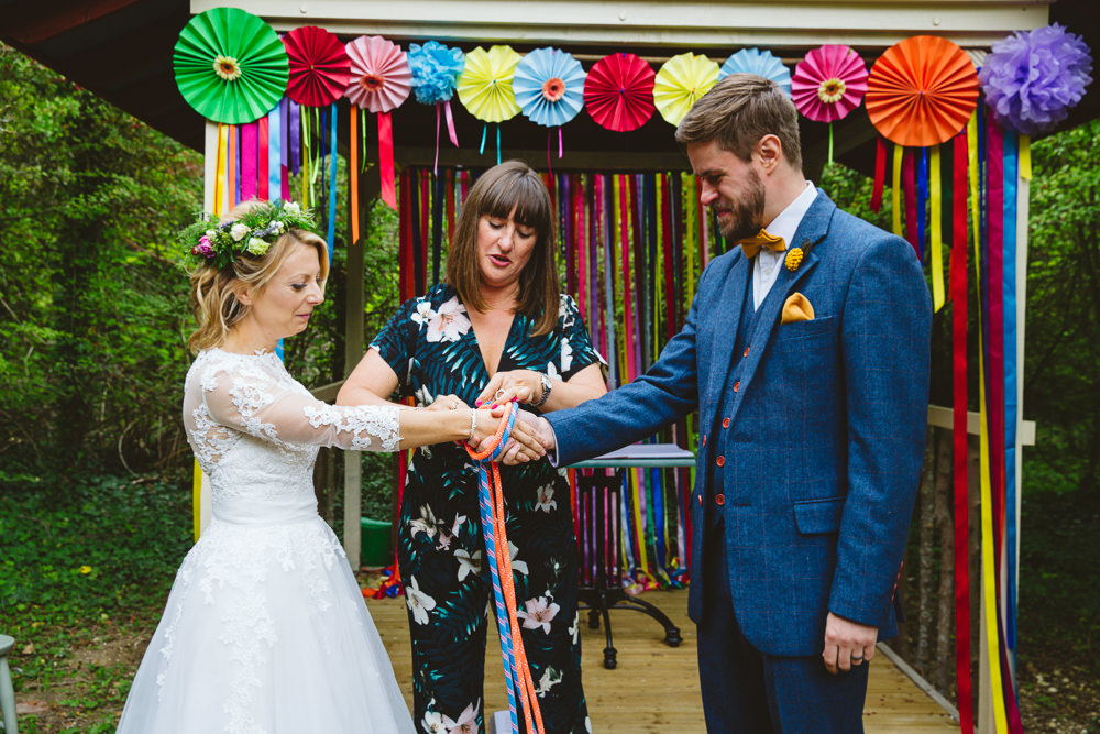 Backdrop Ceremony Arch Pinwheels Ribbons Rainbow Colourful Multicolour Enchanted Garden Events Wedding Sharon Cooper Photography