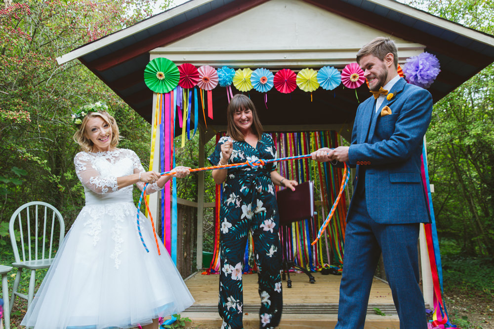 Backdrop Ceremony Arch Pinwheels Ribbons Rainbow Colourful Multicolour Enchanted Garden Events Wedding Sharon Cooper Photography