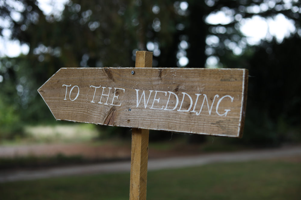 Wooden Sign Signpost Painted Directions Enchanted Garden Events Wedding Sharon Cooper Photography
