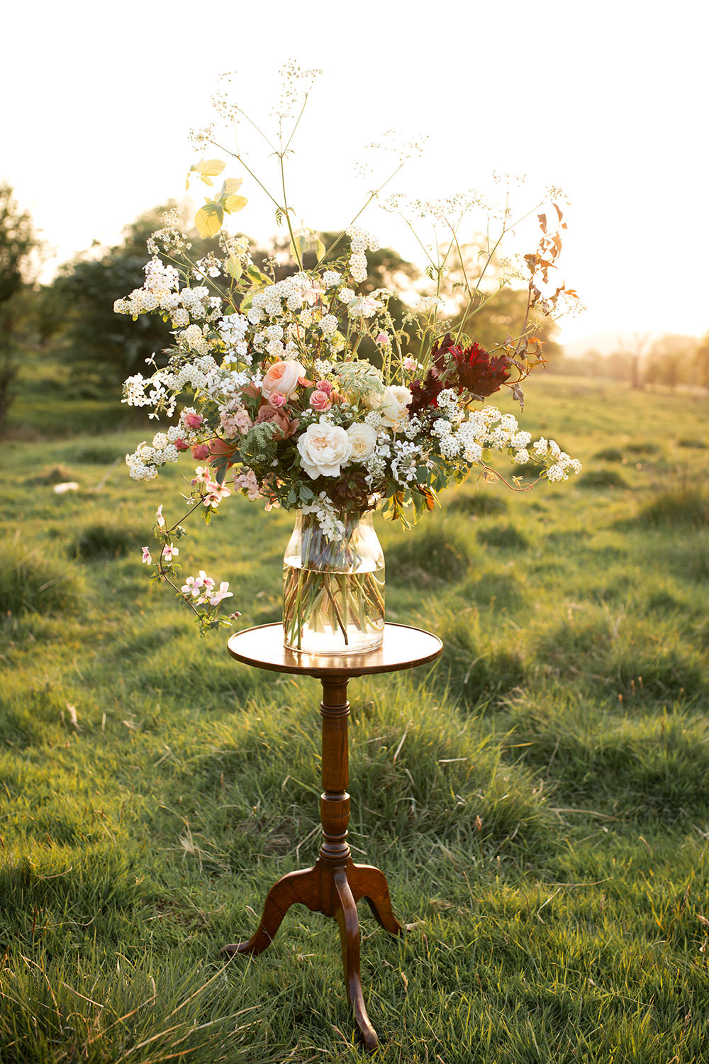 Table Flowers Peach Coral Cream Roses Greenery Foliage Large Vase Tall Light Airy Summer Wedding Ideas Charlotte Palazzo Photography