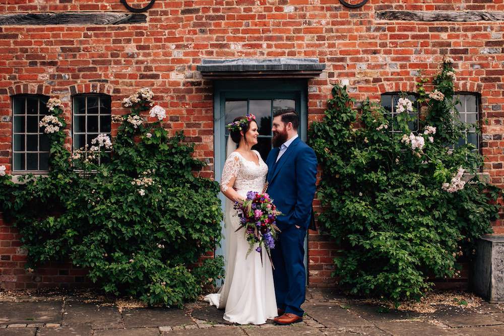 Bride Bridal Dress Gown Lace Sleeves Bodice Train Flower Crown Blue Suit Groom Bouquet Jewel Tone Pink Micklefield Hall Wedding Red On Blonde Photography