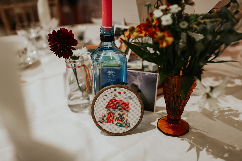 Centrepiece Decor Table Books Candles Tin Flowers Cans Embriodery Hoop Pennard House Wedding Oxi Photography
