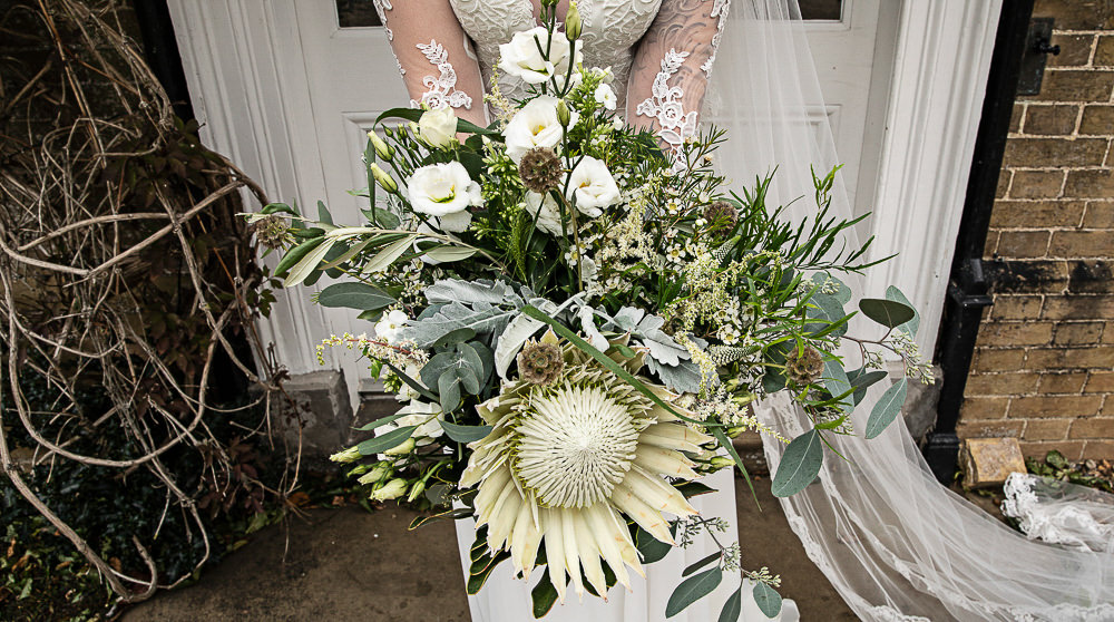 Bouquet Flowers Bride Bridal Protea Greenery Foliage Cream Lithianthus Rustic Botanical Barn Wedding Lorna Newman Photography