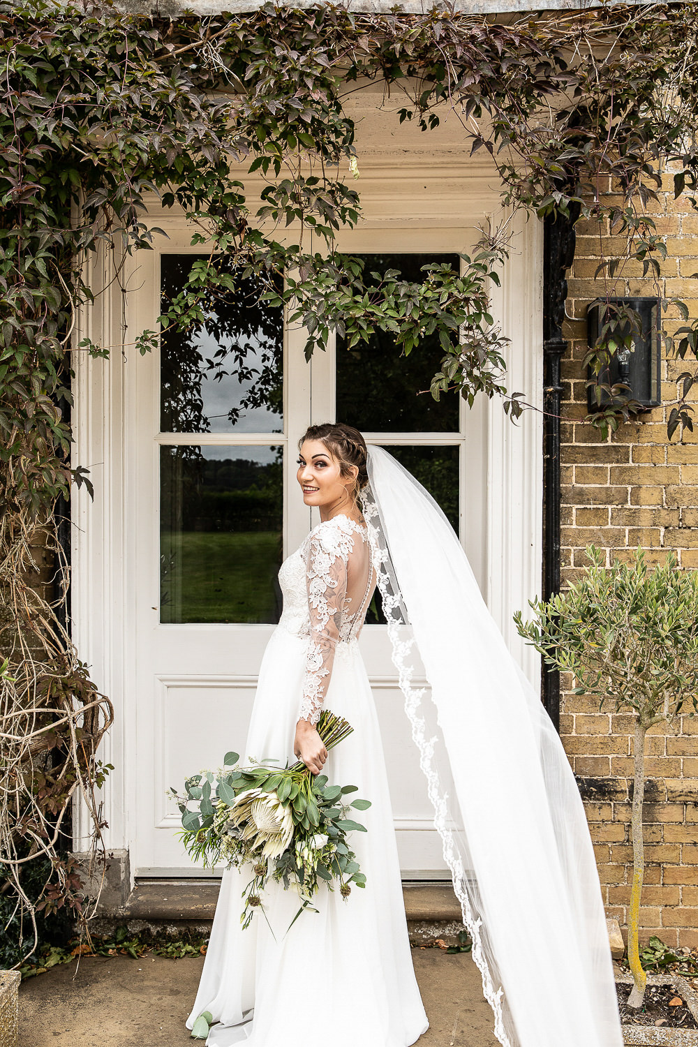 Bride Bridal Dress Gown Lace Veil Sleeves Lillian West Rustic Botanical Barn Wedding Lorna Newman Photography