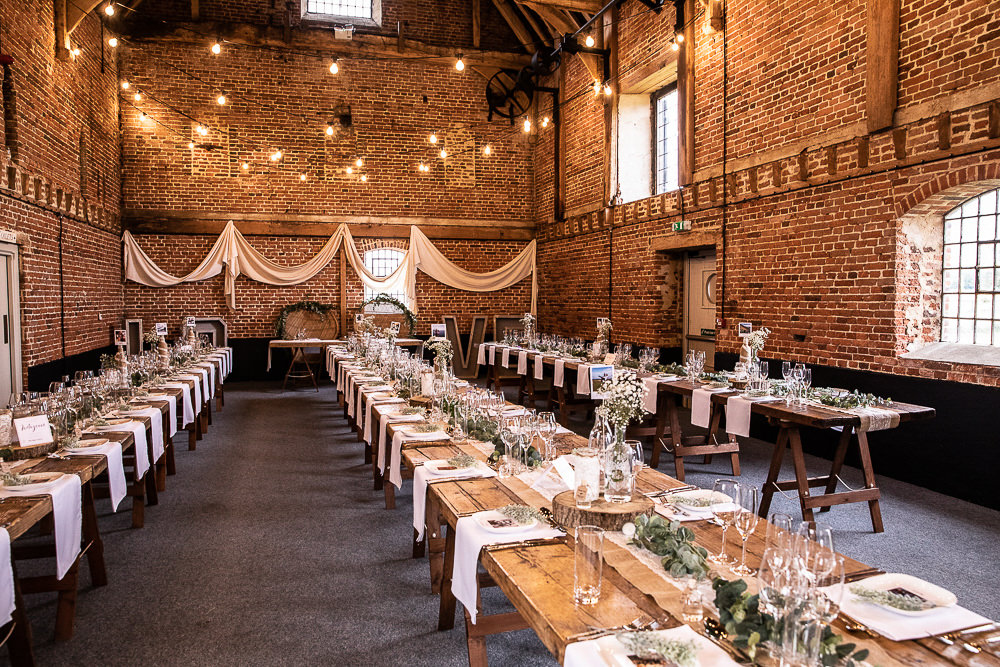 Festoon Lights Drapes Decor Long Tables Greenery Rustic Botanical Barn Wedding Lorna Newman Photography