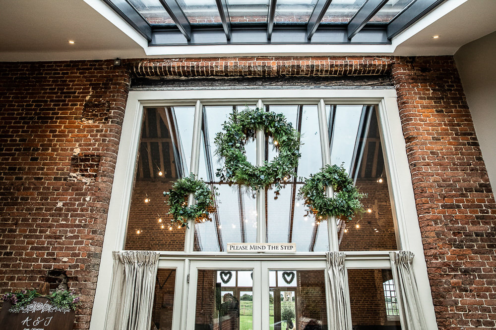Greenery Foliage Wreaths Hoops Rustic Botanical Barn Wedding Lorna Newman Photography