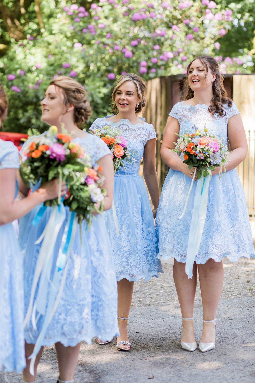 Powder Baby Blue Bridesmaids Tea Length Dress Lace Multicoloured Flowers Bouquet Ribbon Spring Cottage Rivington Wedding Emma B Photography