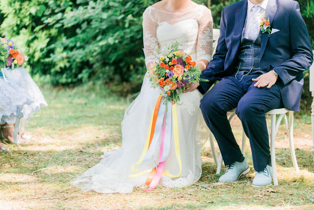 Bride Bridal Strapless Sweetheart Neckline Lace Jacket Sleeves Waistcoat Tweed Check Three Piece Suit Blue Multicoloured Bouquet Ribbon Groom Spring Cottage Rivington Wedding Emma B Photography