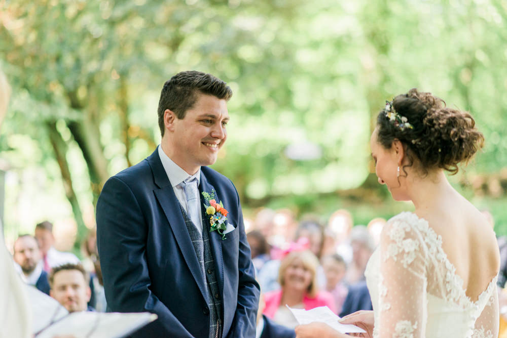 Bride Bridal Strapless Sweetheart Neckline Lace Jacket Sleeves Waistcoat Tweed Check Three Piece Suit Blue Groom Spring Cottage Rivington Wedding Emma B Photography