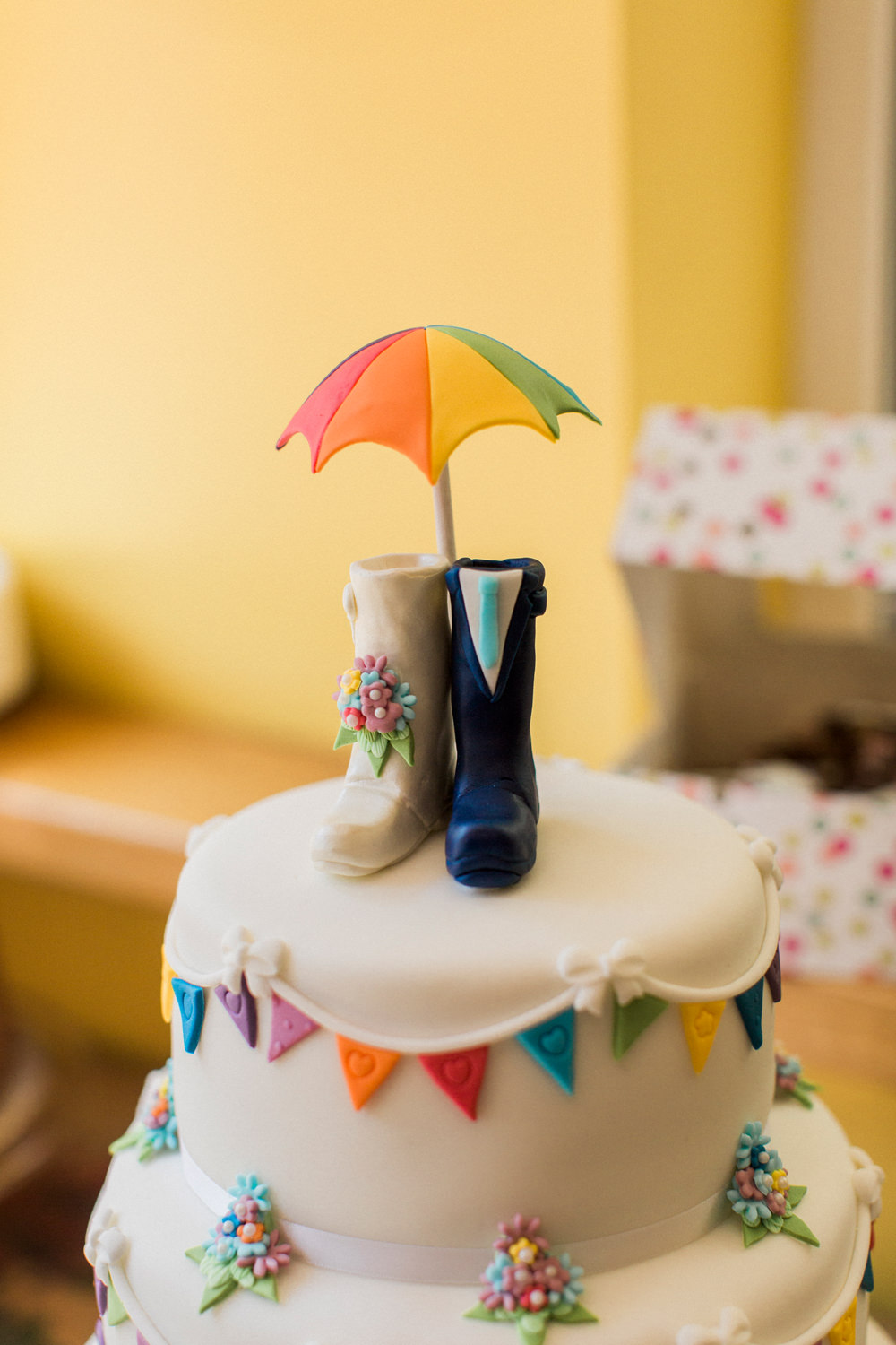 Bunting Tiered Cake Welly Umbrella Topper Spring Cottage Rivington Wedding Emma B Photography