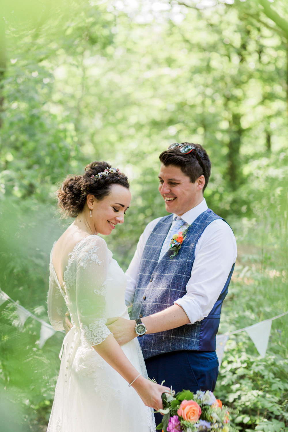 Bride Bridal Strapless Sweetheart Neckline Lace Jacket Sleeves Waistcoat Tweed Check Three Piece Suit Blue Multicoloured Bouquet Ribbon Spring Cottage Rivington Wedding Emma B Photography