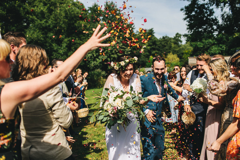 Bride Bridal Boho Wide Sleeve Dress Gown Embellished Flower Crown Blue Suit Tweed Three Piece Waistcoat Groom Foliage Bouquet Confetti Stonyford Cottage Gardens Wedding Jessica O'Shaughnessy Photography