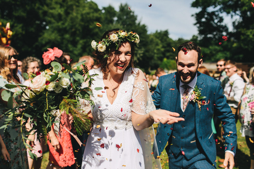 Bride Bridal Boho Wide Sleeve Dress Gown Embellished Flower Crown Blue Suit Tweed Three Piece Waistcoat Groom Foliage Bouquet Confetti Stonyford Cottage Gardens Wedding Jessica O'Shaughnessy Photography