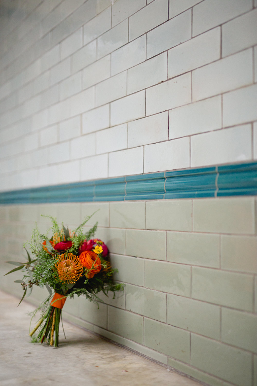 Bride Bridal Red Orange Bouquet Victoria Baths Wedding Mark Newton Weddings