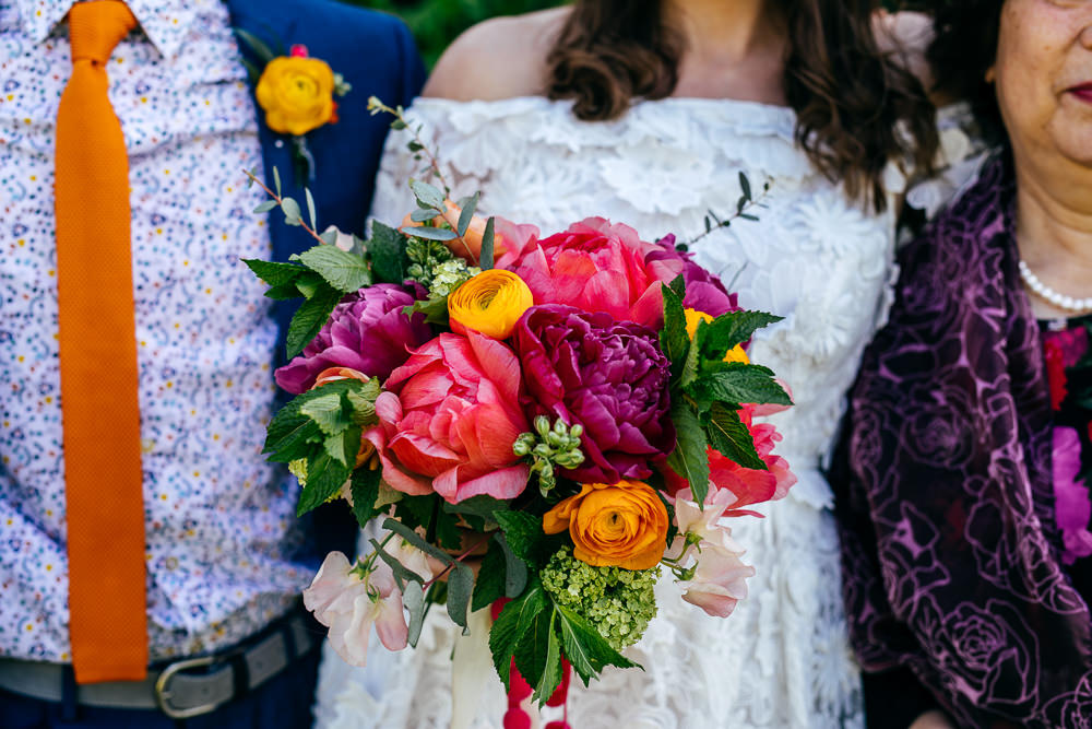 Bouquet Flowers Bride Bridal Colourful Pom Poms Peonies Ranunculus Craspedia Alliums Protea Pink Orange Ash Barton Estate Wedding Jordanna Marston Photography