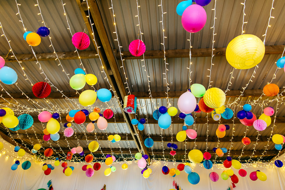 Rainbow Colourful Pom Poms Fairy Lights Lanterns Ash Barton Estate Wedding Jordanna Marston Photography