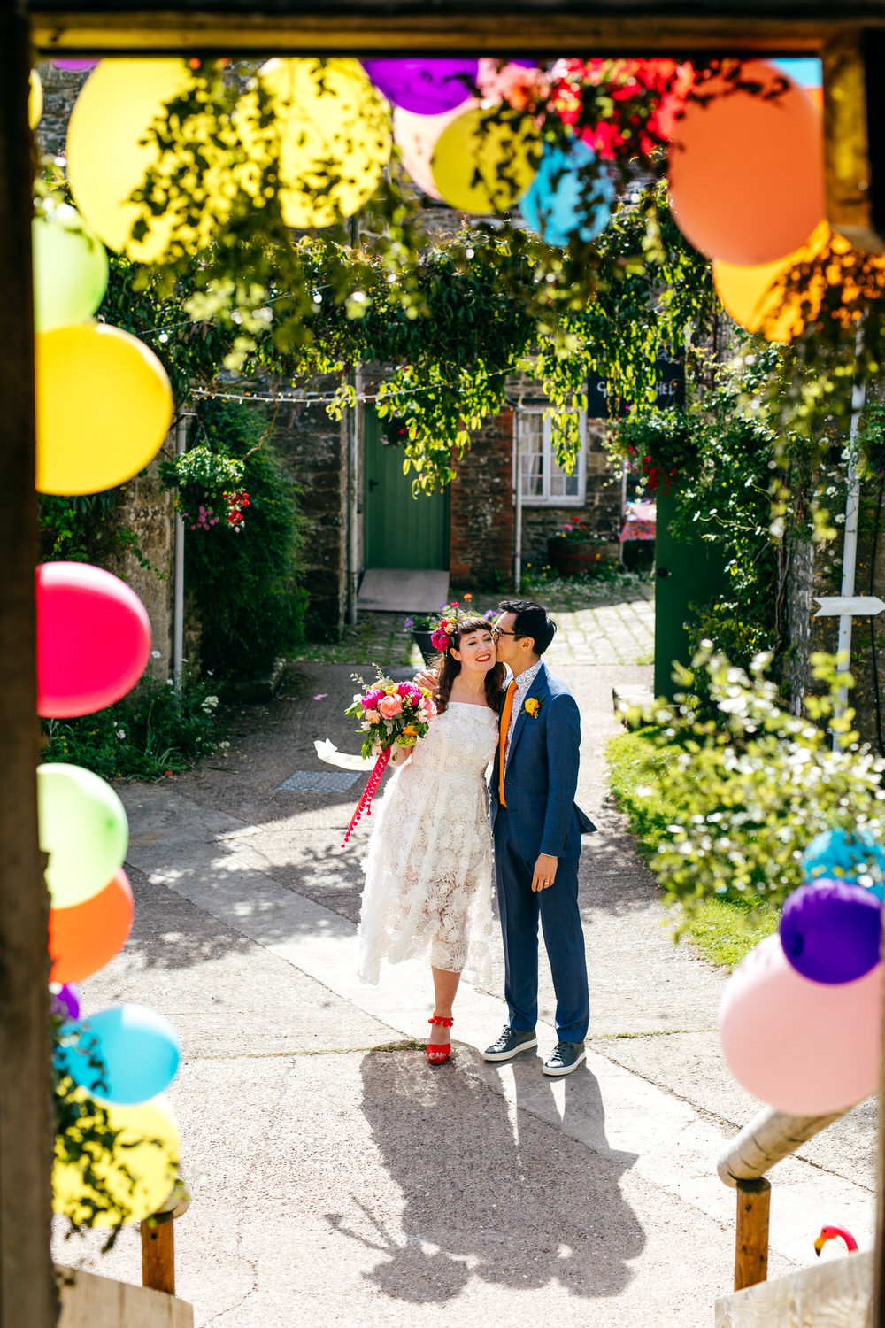 Rainbow Colourful Balloon Installation Door Ash Barton Estate Wedding Jordanna Marston Photography