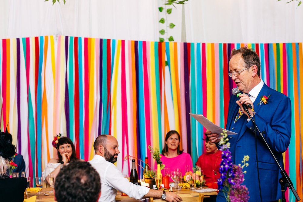 Rainbow Colourful Ribbon Backdrop Ash Barton Estate Wedding Jordanna Marston Photography