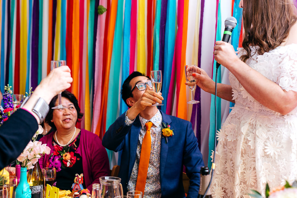 Rainbow Colourful Ribbon Backdrop Ash Barton Estate Wedding Jordanna Marston Photography