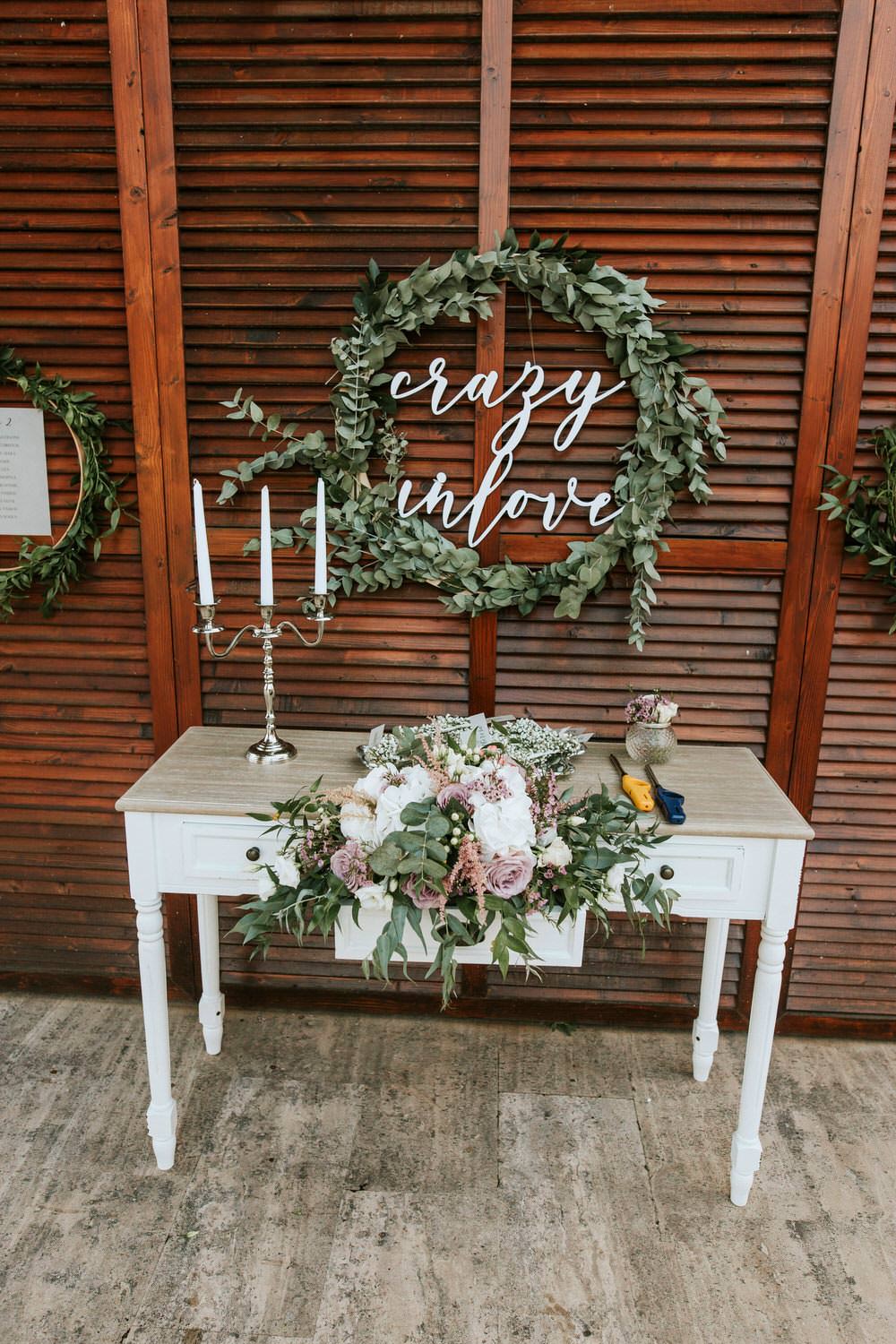 Seating Plan Table Chart Table Botanical Greenery Foliage Wreath Hoop Backdrop Flowers Bohemian Beach Greece Destination Wedding Lighthouse Photography