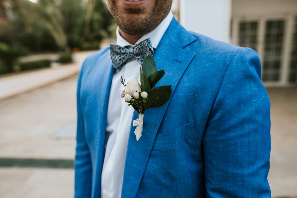 Groom Blue Suit Bow Tie Buttonhole Bohemian Beach Greece Destination Wedding Lighthouse Photography