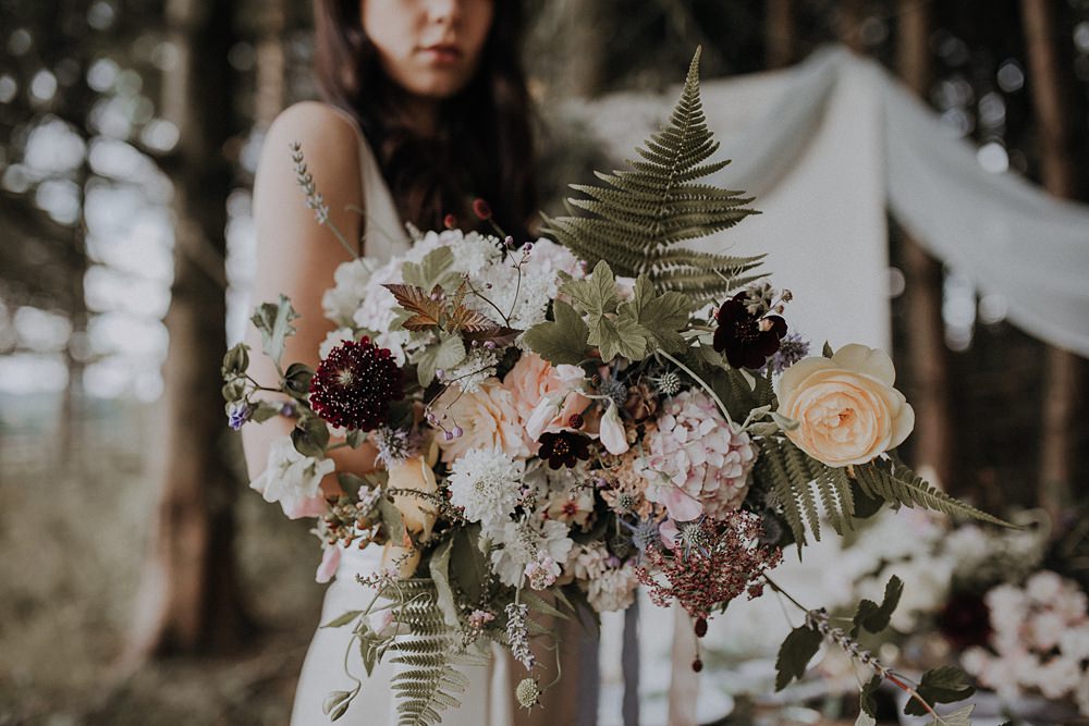 Bouquet Flowers Bride Bridal Wild Natural Whimsical Ribbons Foliage Greenery Hydrangea Berry Sweetpeas Ferns Rose Bohemian Woodland Wedding Ideas Lola Rose Photography