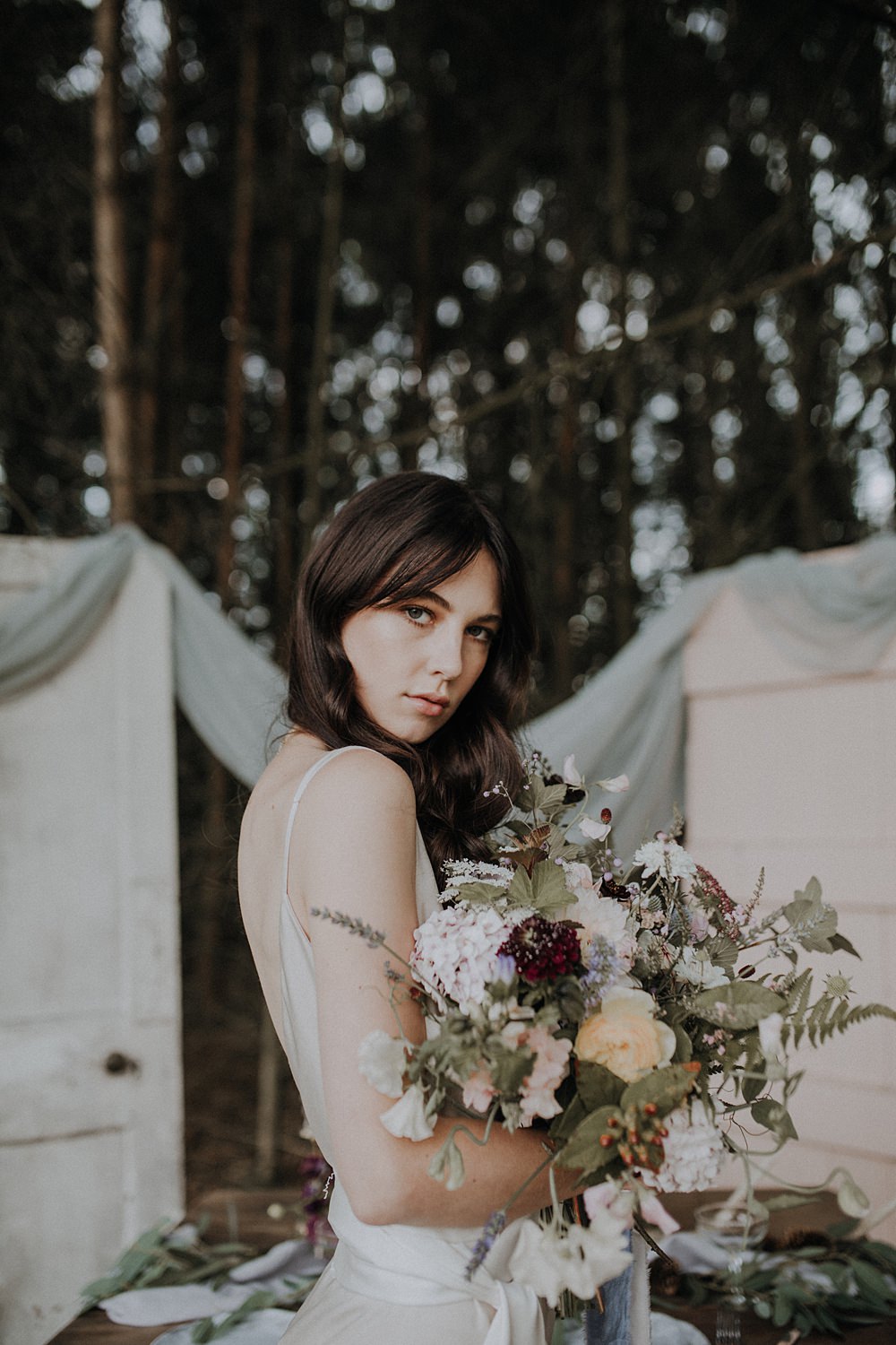 Bouquet Flowers Bride Bridal Wild Natural Whimsical Ribbons Foliage Greenery Hydrangea Berry Sweetpeas Ferns Rose Bohemian Woodland Wedding Ideas Lola Rose Photography
